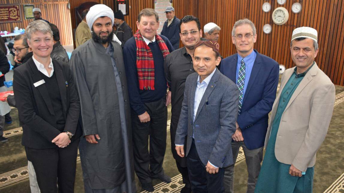 STANDING TOGETHER: Councillor Joanne McRae, Sulaiman Siddiqui, mayor Reg Kidd, Rashid Walayat, Khalid Tufail, councillor Stephen Nugent and Muhammad Aamer during the Eid-ul-Adh Festival last year. Photo: SUPPLIED