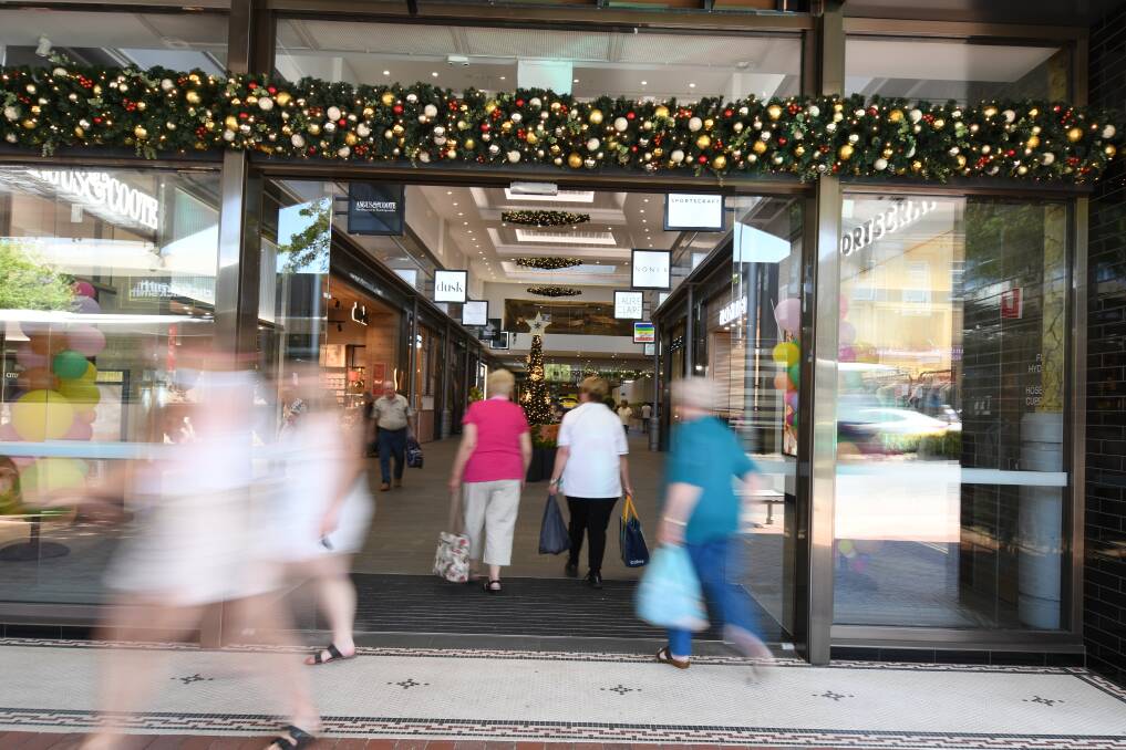 UPTURN: People were still keenly shopping at Orange City Centre on Tuesday. Photo: JUDE KEOGH