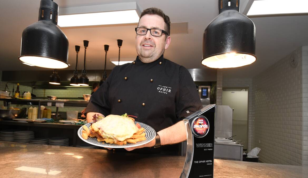 WINNING DISH: Ophir Hotel head chef Mark Tracey with the chicken parmigiana.