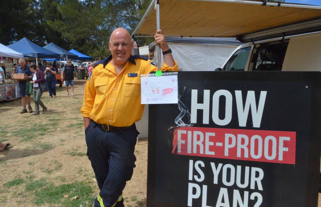 OUT IN FRONT: RFS Education officer and Orange North West brigade deputy captain Chris Googe at Saturday's markets.
