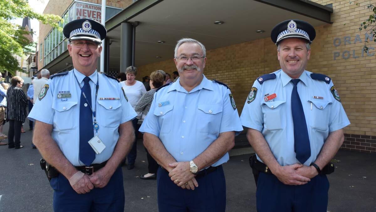 SEND-OFF: Central West Police District Superintendent Chris Taylor, retiring Senior Constable Ron McGovern and Chief Inspector Peter Atkins. Photo: DANIELLE CETINSKI