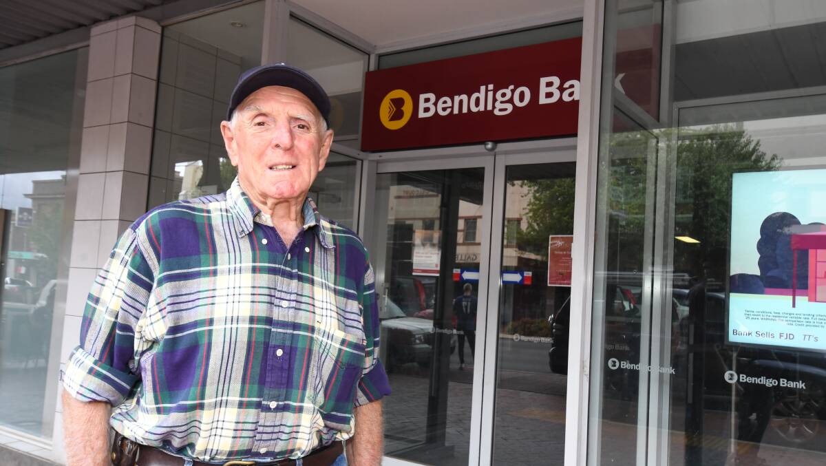 UNHAPPY CUSTOMER: John Armstrong is disappointed Bendigo Bank will close its Orange branch in April. Photo: JUDE KEOGH 0208jkbendigo1