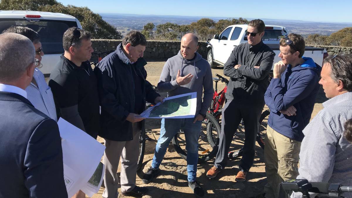 Mr Waddell (third from right) was one of the council contingent to meet with Environment Minister Matt Kean recently about a mountain bike trail centre at Mount Canobolas. 
