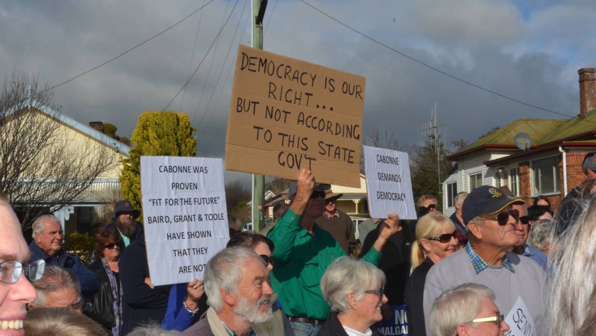 HEARD AT LAST: Cabonne residents during an anti-merger rally in June. They remain vigilant following the decision to abandon regional amalgamations. Photo: DANIELLE CETINSKI 0618dcrally2