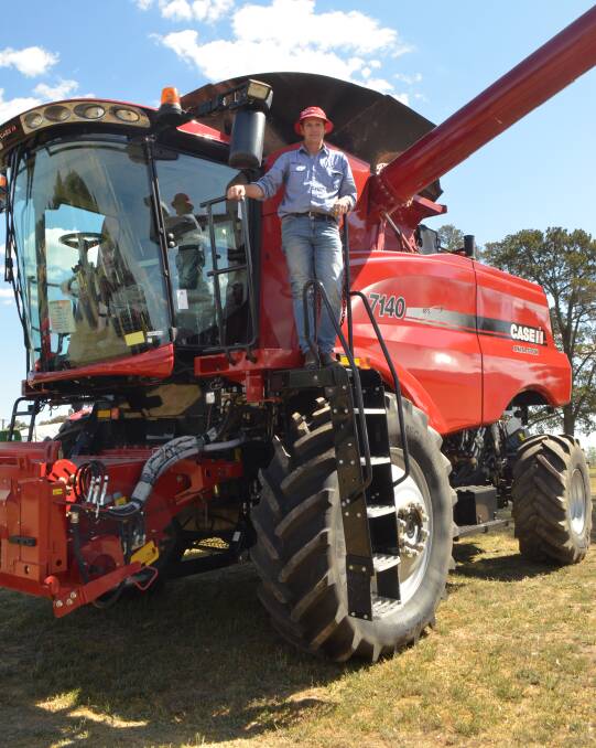MEGA MACHINE: Cowra-based sales manager Ian Trethewey with the wheat header, on display at the Australian National Field Days from Thursday until Saturday. Photo: DANIELLE CETINSKI