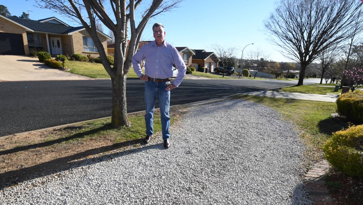 FINED: Councillor Glenn Taylor said the residents of this Sieben Drive property were fined for parking on the gravel. Photo: JUDE KEOGH 0913jkfine1