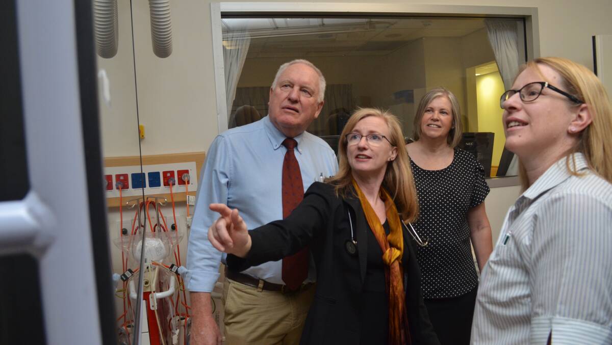 LIFE-SAVING WORK: Western NSW parliamentary secretary Rick Colless, Dr Ruth Arnold, Estelle Ryan and Kath McMaster in the cath lab. Photo: DANIELLE CETINSKI