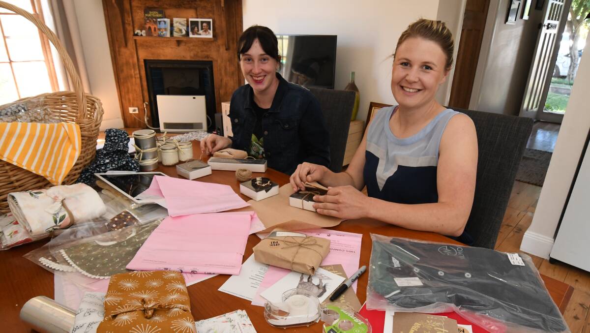 OPEN FOR BUSINESS: Alexis Neville and Jana Poppe of Ella's World. Photo: JUDE KEOGH 1113jkbusiness3