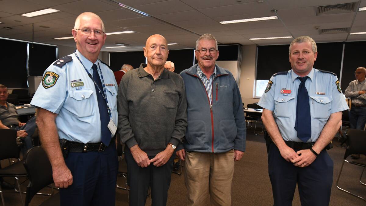 WELCOME BACK: Central West Police District Superintendent Chris Taylor, retired officers Ross Smith and Ian Hatswell and Chief Inspector Peter Atkins. Photo: JUDE KEOGH