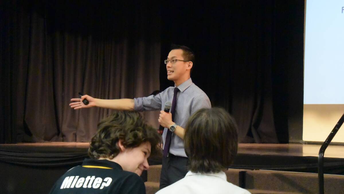 Eddie Woo sets the students a task.
