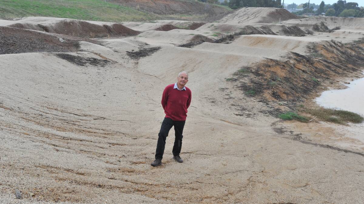 HEAP OF GRAVEL: Councillor Russell Turner says he has not seen many BMX riders use the track at Anzac Park. Photo: JUDE KEOGH 0323jkbmx2
