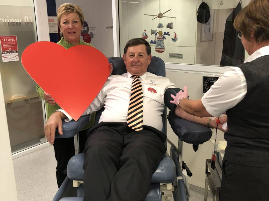 MUSTERING THE COURAGE: Mayor Reg Kidd donates blood at the Kite Street centre. Photo: SUPPLIED