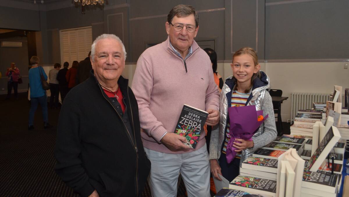 CELEBRATED WORK: Poetry winner David Taylor, mayor Reg Kidd and third-place in the children's category, Matilda Stafford. Photo: DANIELLE CETINSKI