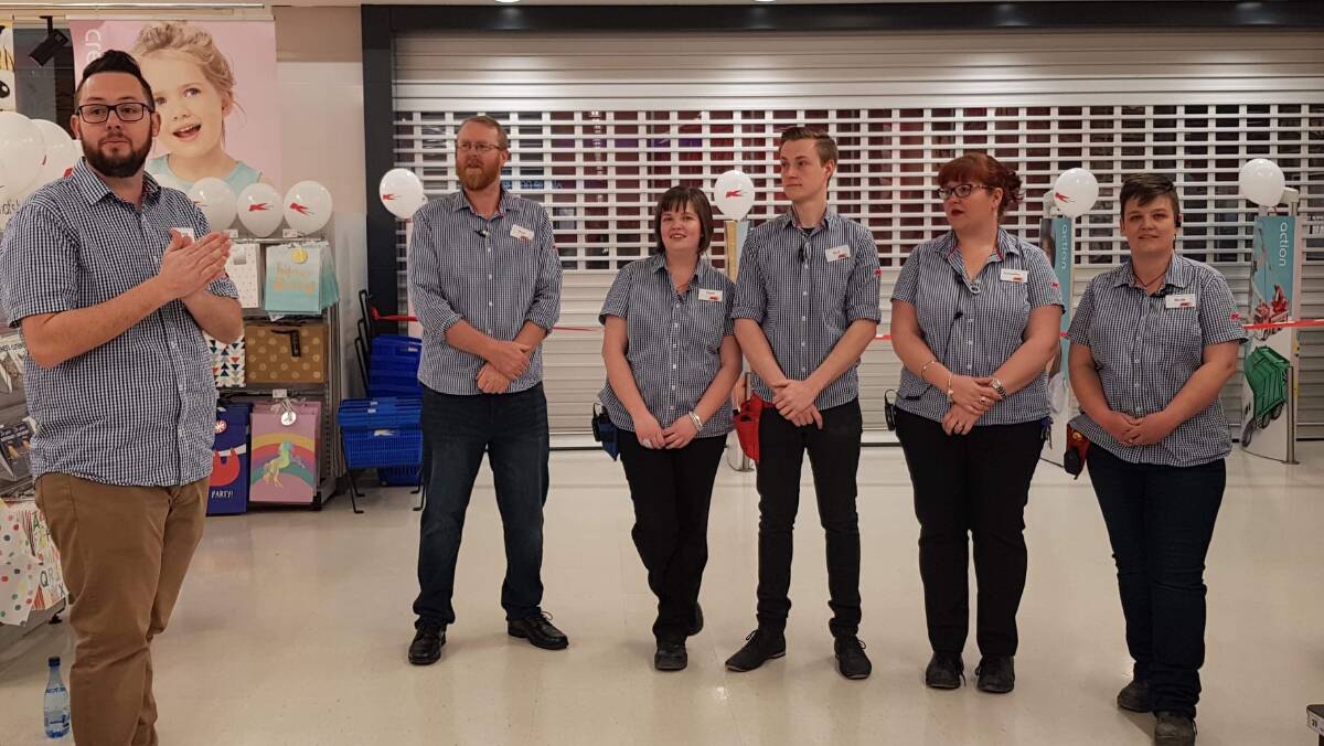 READY TO LAUNCH: The Kmart Orange team prepares to open for its official launch. Photo: SUPPLIED
