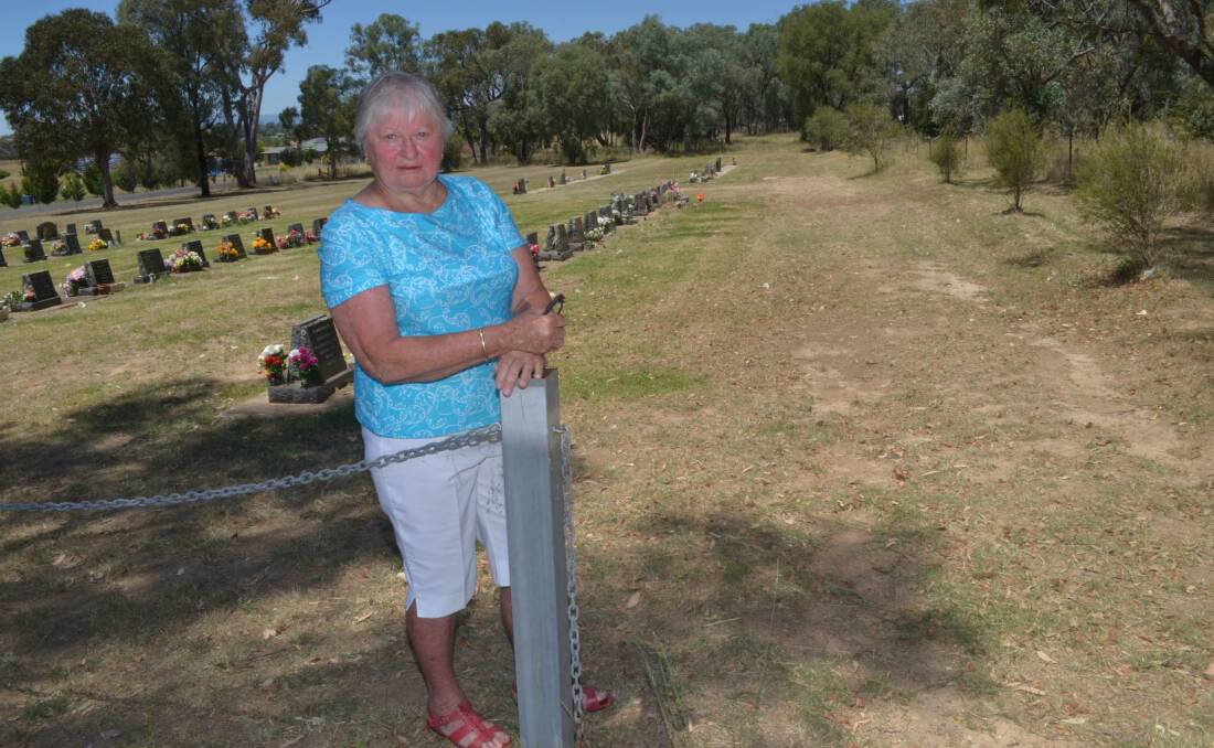 RESPECT REQUESTED: Eileen Ford wants an alternate access to the newer section of Molong Cemetery. Photo: DECLAN RURENGA 0112drgraves3