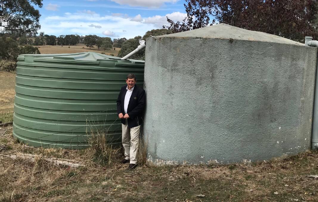 SAVING WATER: Mayor Reg Kidd with his water tanks. Photo: SUPPLIED