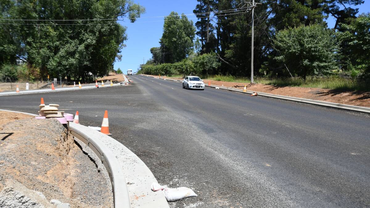 IN PROGRESS: The temporary seal at the Witton Place intersection, designed to protect the road until crews return in late January. Photo: JUDE KEOGH