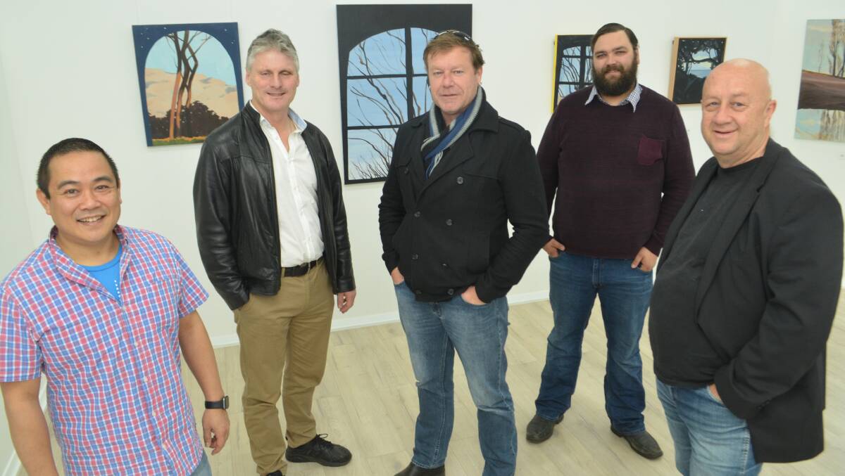 THEATRE AMONG ART: Pinnacle Players owner Peter Young, actors Mark Coster and Nick Tucknott, owner Jeff Thorn and actor Alvaro Marques.