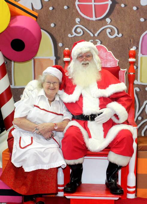 SPEADING CHEER: Mrs Claus and Santa Claus have been a regular institution in Orange since 2002. 