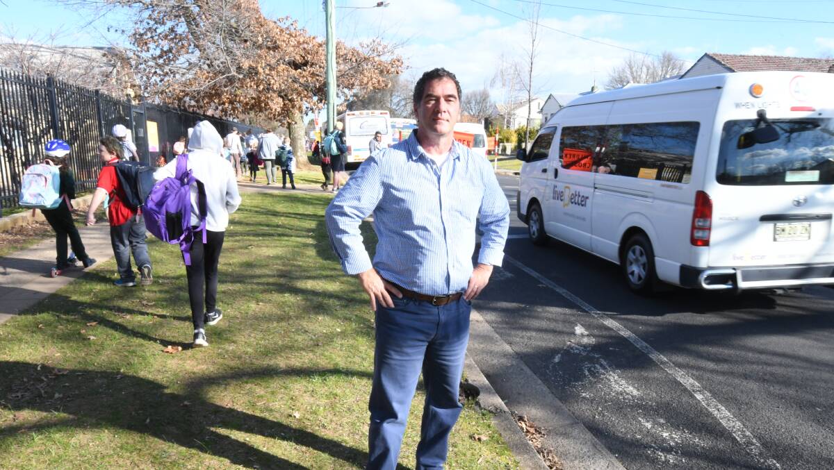 KISS AND DROP: Councillor Tony Mileto said Glenroi Heights Public School recently had the words 'kiss and drop' added to their no parking signs to alleviate driver confusion. Photo: JUDE KEOGH