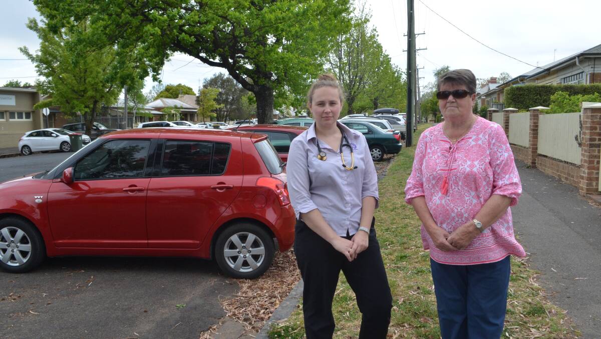 FULL LOT: Canobolas Family Pet Hospital Dr Lauren Slater and resident Helen Merchant want to see two-hour parking in Dora Street.