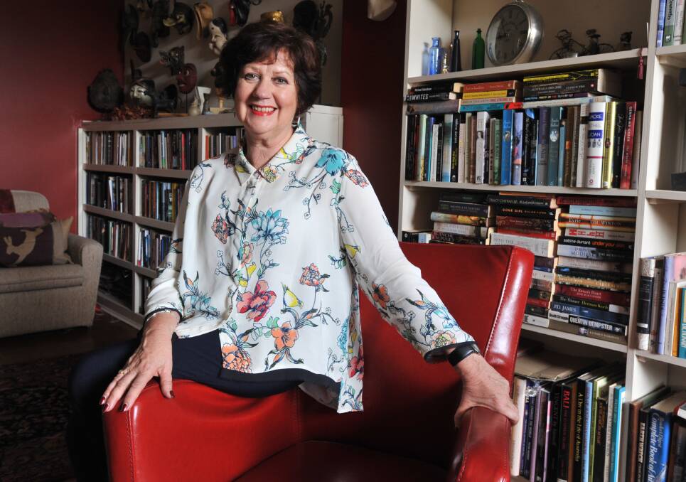 BOOK WORM: Central West Libraries manager Jan Richards will become a Member of the Order of Australia. Photo: JUDE KEOGH 0124jkjan1