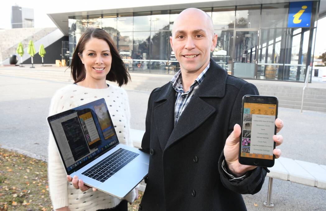 FILLING A GAP: Fiona and Brad Murray show off their app, which is almost complete. Photo: JUDE KEOGH