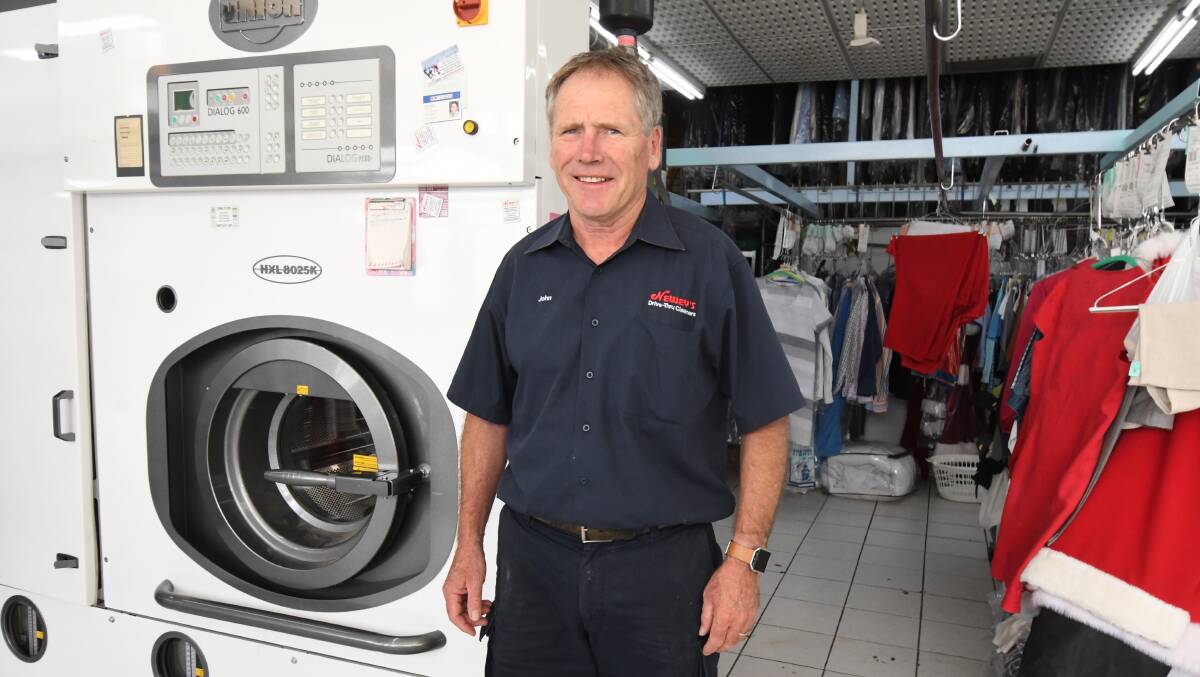 CHIPPING IN: Newey's Drive Thru Cleaners owner John Colgan has decided not to run cleaning services on Saturdays to save water. Photo: JUDE KEOGH 0116jkneweys1