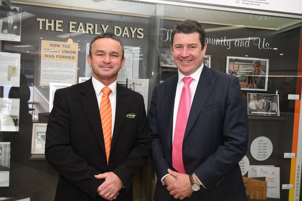 CHANGE AFOOT: Orange Credit Union outgoing general manager Paul McNamara incoming general manager Andrew de Graaff. Photo: JUDE KEOGH
