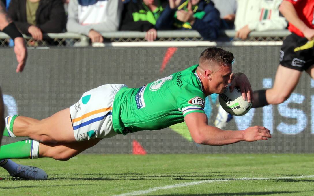 FINE FORM: Canberra's Jack Wighton scores a try in Saturday's NRL win over Penrith at Wagga. Picture: Les Smith. 