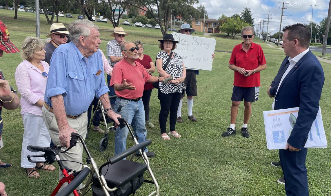 Member for Bathurst Paul Toole speaks to the crowd at the launch of his community petition, including John Hollis (right) and Greg Madden (sixth from right, wearing hat).