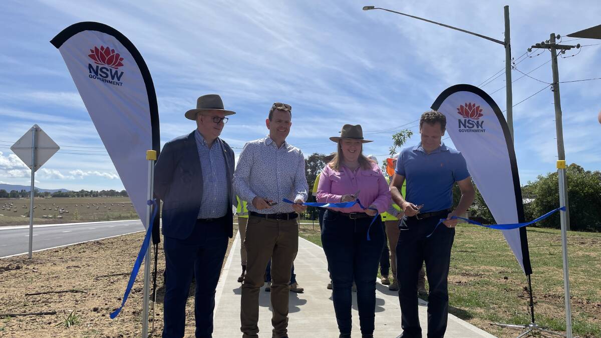 Transport for NSW's regional director west Alistair Lunn (left) was with Labor's Stephen Lawrence, the duty MLC for Bathurst; Regional Transport Minister Jenny Aitchison; and Bathurst mayor Jess Jennings at the recent ribbon-cutting for the widened highway from Kelso to Raglan.