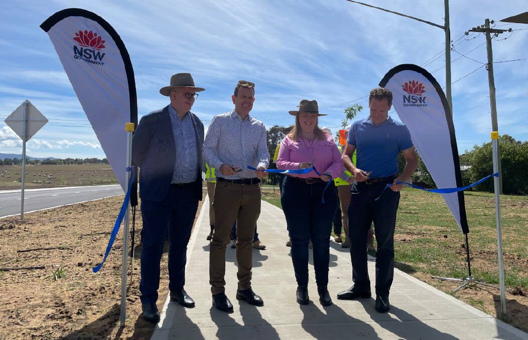 Transport for NSW's regional director west Alistair Lunn; Labor's Stephen Lawrence, the duty MLC for Bathurst; Regional Transport Minister Jenny Aitchison; and Bathurst mayor Jess Jennings at the ribbon-cutting for the Kelso to Raglan project.