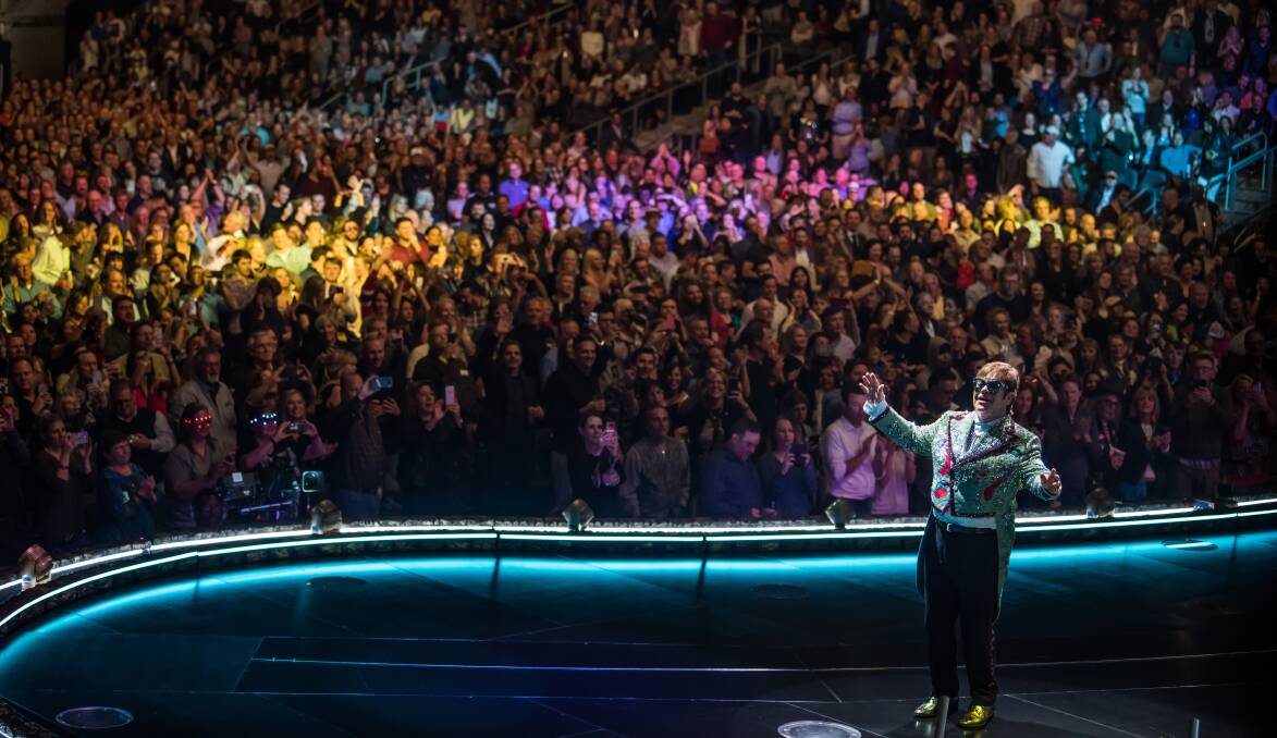 CROWDED HOUSE: Sir Elton John, pictured during a show at Atlanta in the USA, will play at Bathurst's rugby league ground, Carrington Park. Photo: BEN GIBSON