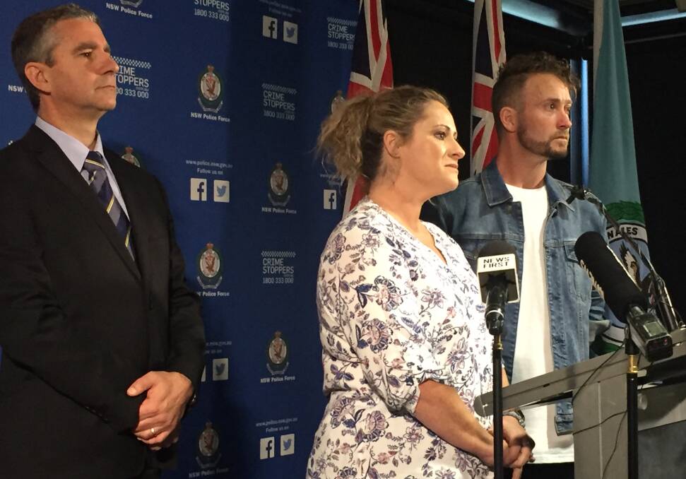 HURT: Homicide Squad Commander, Detective Superintendent Scott Cook, with Janine Vaughan's sister Kylie Spelde and brother Adam Vaughan on Friday.