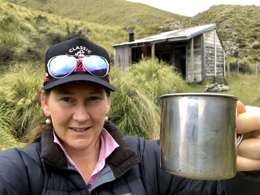 Photographer and author, Alice Mabin outside the New Zealand hut she isolated herself in over the Christmas break. Ironicially, the only decent photos during the experience were taken with her mobile phone.