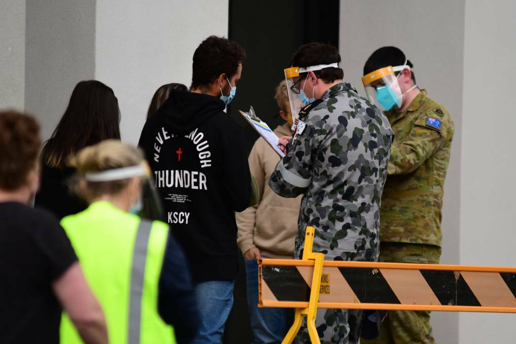 ADF: People line up to get vaccinated at the Dubbo hub this week.