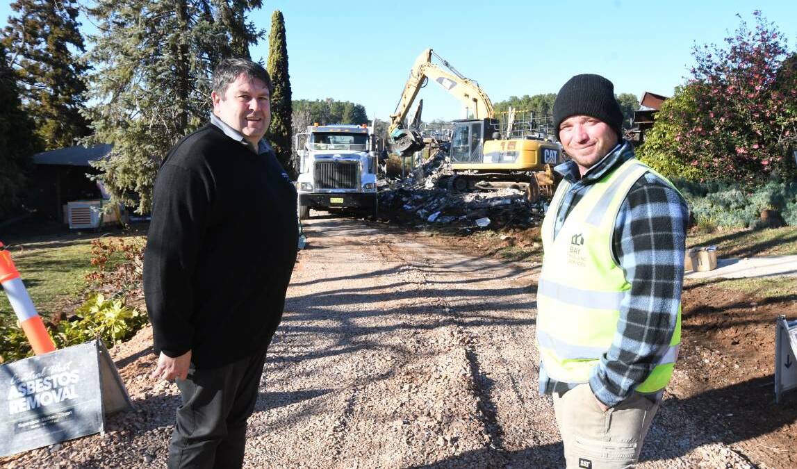 FIRE: Wentworth golf club general manager James Bale with demolition site supervisor Nick Worldon. Photo: JUDE KEOGH 0621jkdemo1