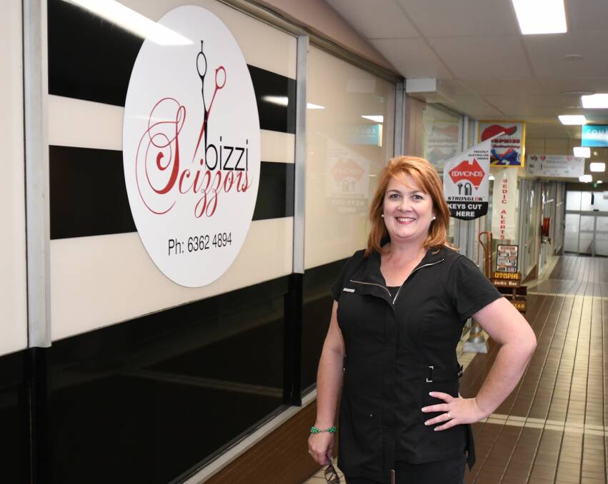 ON THE MOVE: Bizzi Scizzors owner Lynn Bowman at her business. Photo: JUDE KEOGH 0312jkbizzi1 