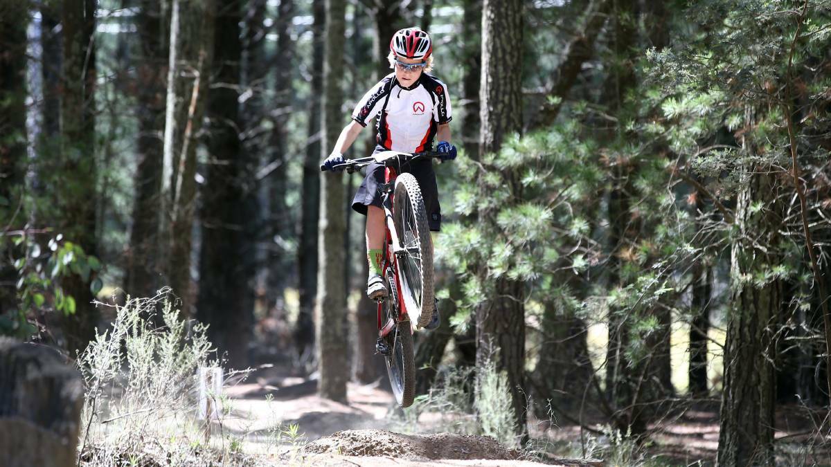 FLYING HIGH: Orange is known as a top mountain biking venue with events including the Mountain Bike Australia Cross-Country National Season at Kinross State Forest.