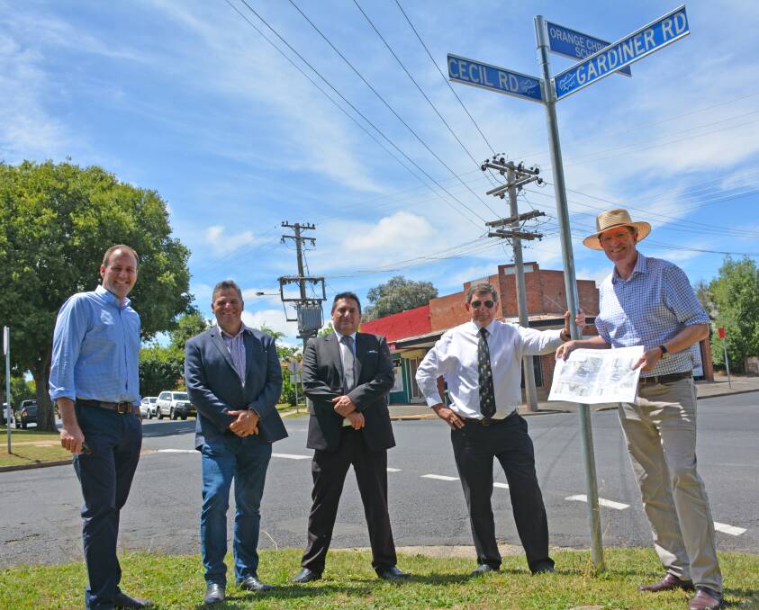 PLANS: Sam Farraway, Phil Donato, Jason Theakstone (Orange City Council), Cr Reg Kidd and Andrew Gee at the intersection on Wednesday. Photo: Supplied