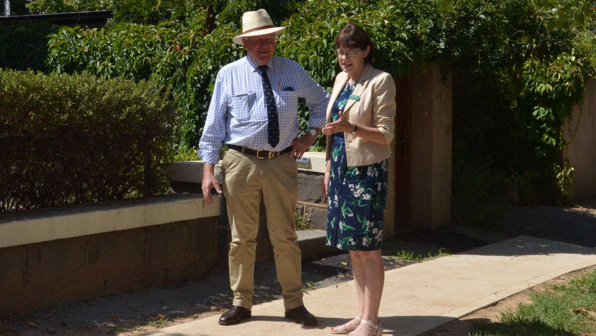 PROGRESS: Parliamentary secretary for Western NSW Rick Colless and Nationals candidate Kate Hazelton on an upgraded footpath in Clinton Street.
