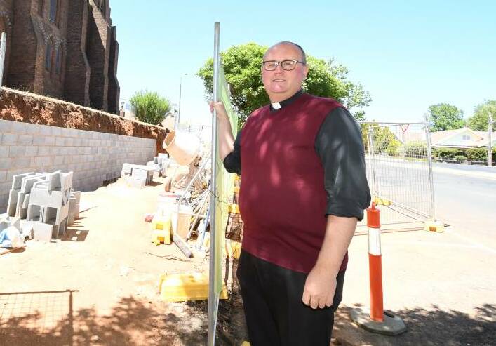 COMMUNITY SPIRIT: Fr Greg Bellamy, the Orange parish priest, at St Josephs which is undergoing work. Photo: JUDE KEOGH