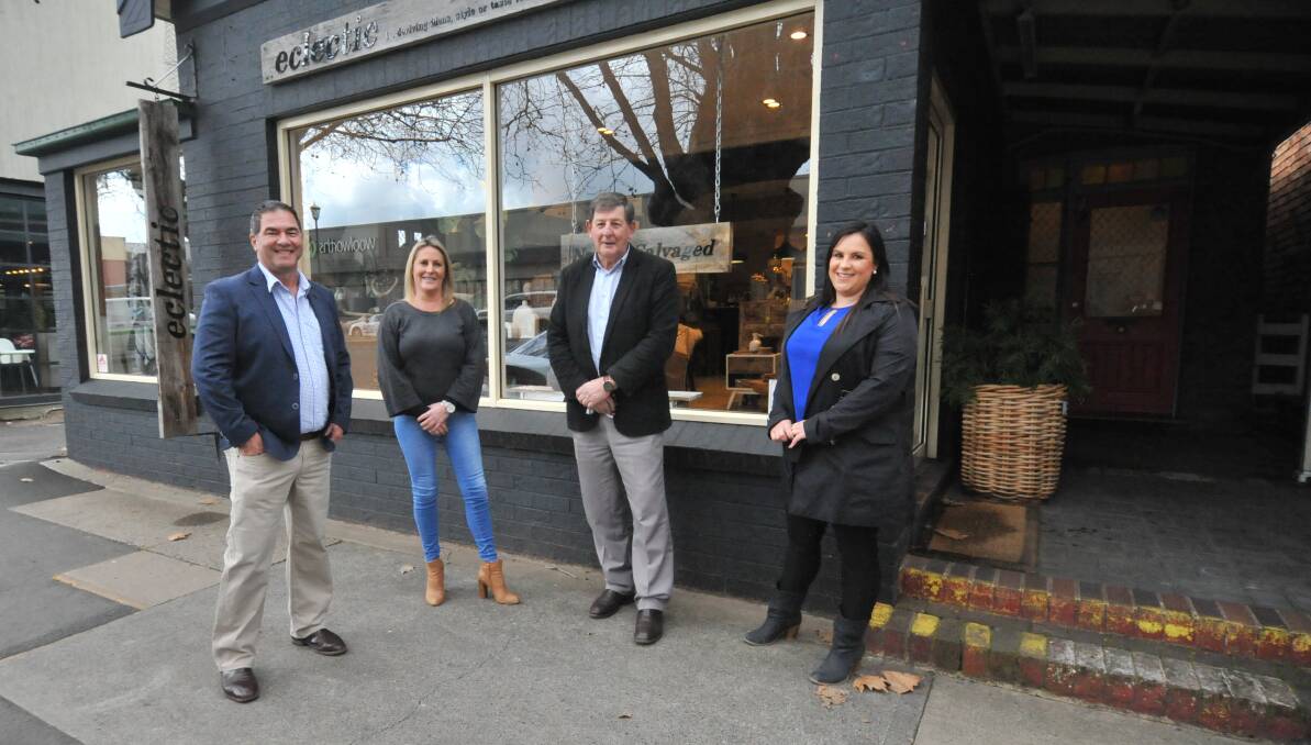 ONLINE ACTION: Cr Tony Mileto, Kerryn Westgeest, Cr Reg Kidd and Tamara Pearson at the Eclectic store in Anson Street. Photo: CARLA FREEDMAN