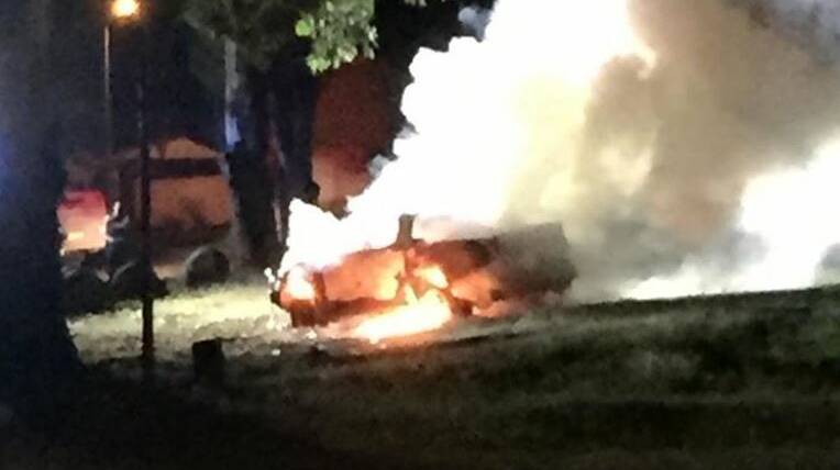 DESTROYED: The ute on fire in Cootes Park. Photo: Instagram