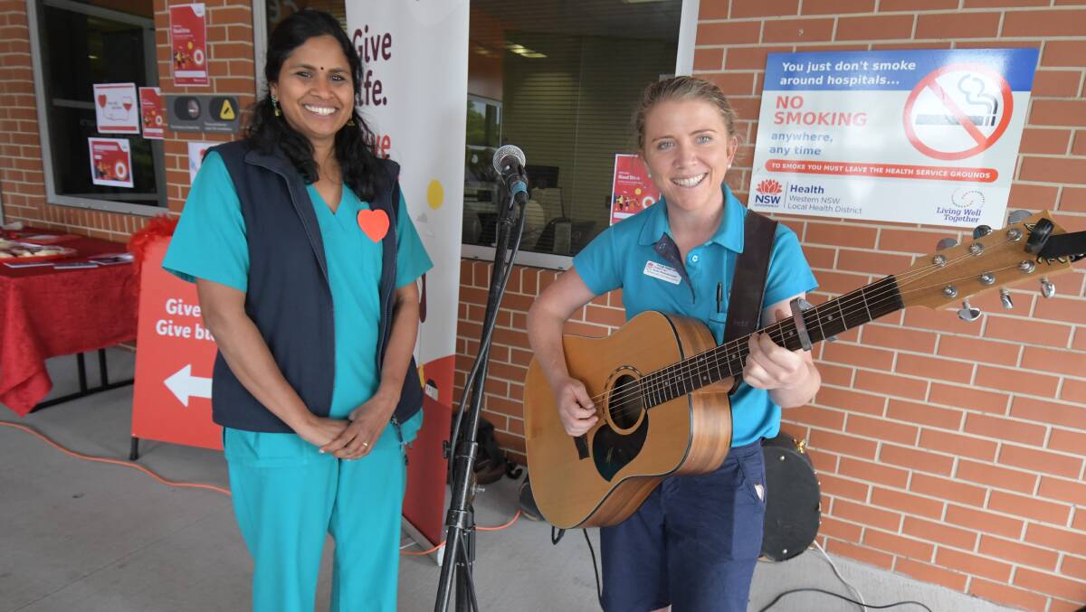 GREAT CAUSE: Dr Sumitha Gounden with performer Clancy Pye at the blood drive event at Orange Hospital on Wednesday. Photo: JUDE KEOGH
