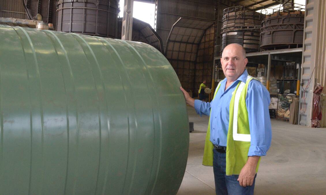 BIG DEMAND: Bushmans' NSW state manager Ray Agland inspects a tank at the Orange manufacturing plant in Colliers Avenue. Photo: DAVID FITZSIMONS