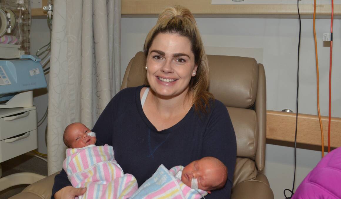 ALL SMILES: Orange mum Monique Webb with 11-day-old twins Raffie and Remy in Orange hospital. Photo: DAVID FITZSIMONS 0402dfwebb6