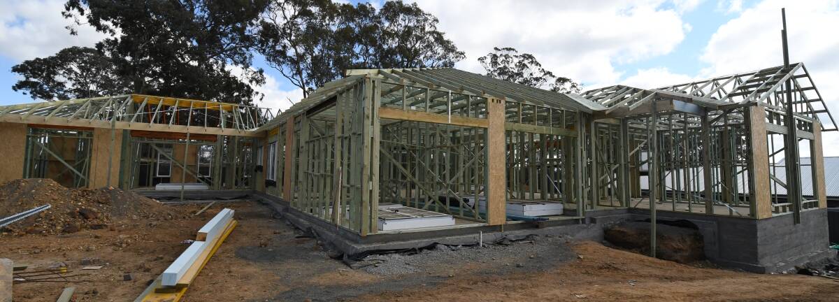 NOT FINISHED: Work has stopped on Fiona Bond's dream home after she paid $370,000. Photo: JUDE KEOGH
