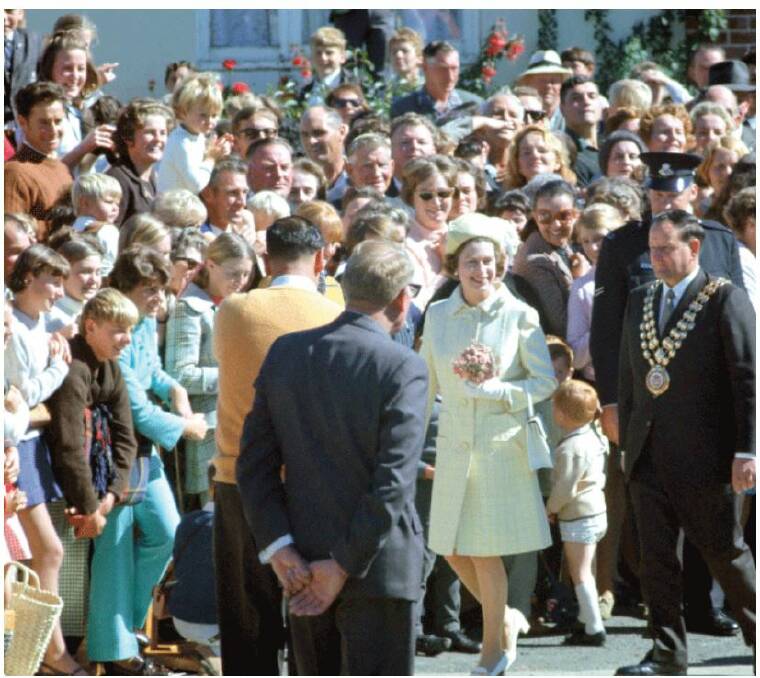 MEET AND GREET: The Queen on her walk along Summer Street in 1970 is cheered on by thousands who lined the street to greet her.